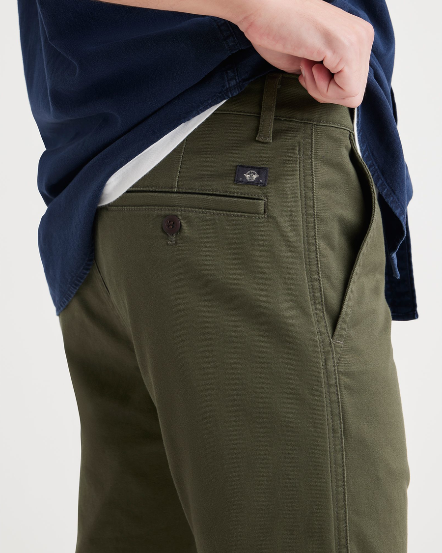 View of model wearing Army Green Original Chinos, Slim Fit.