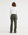 Back view of model wearing Army Green Signature Iron Free Khakis, Pleated, Classic Fit with Stain Defender®.