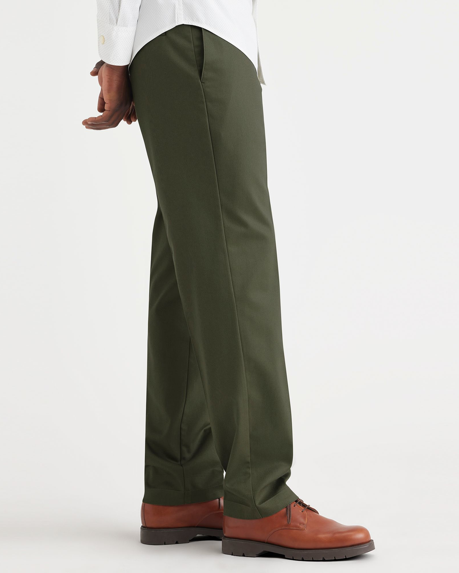 Side view of model wearing Army Green Signature Iron Free Khakis, Straight Fit with Stain Defender®.