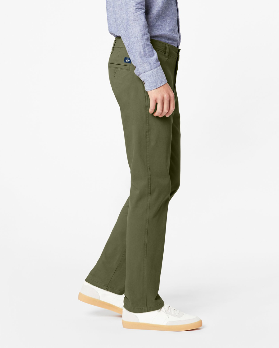 Side view of model wearing Army Olive Ultimate Chinos, Slim Fit.