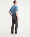 Back view of model wearing Asphalt Original Chinos, Slim Fit.