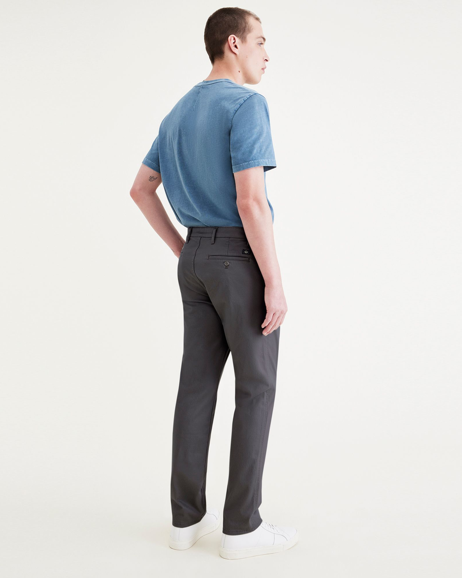 Back view of model wearing Asphalt Original Chinos, Slim Fit.