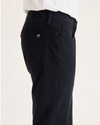 Side view of model wearing Beautiful Black All-Day 5-Pocket, Slim Fit.