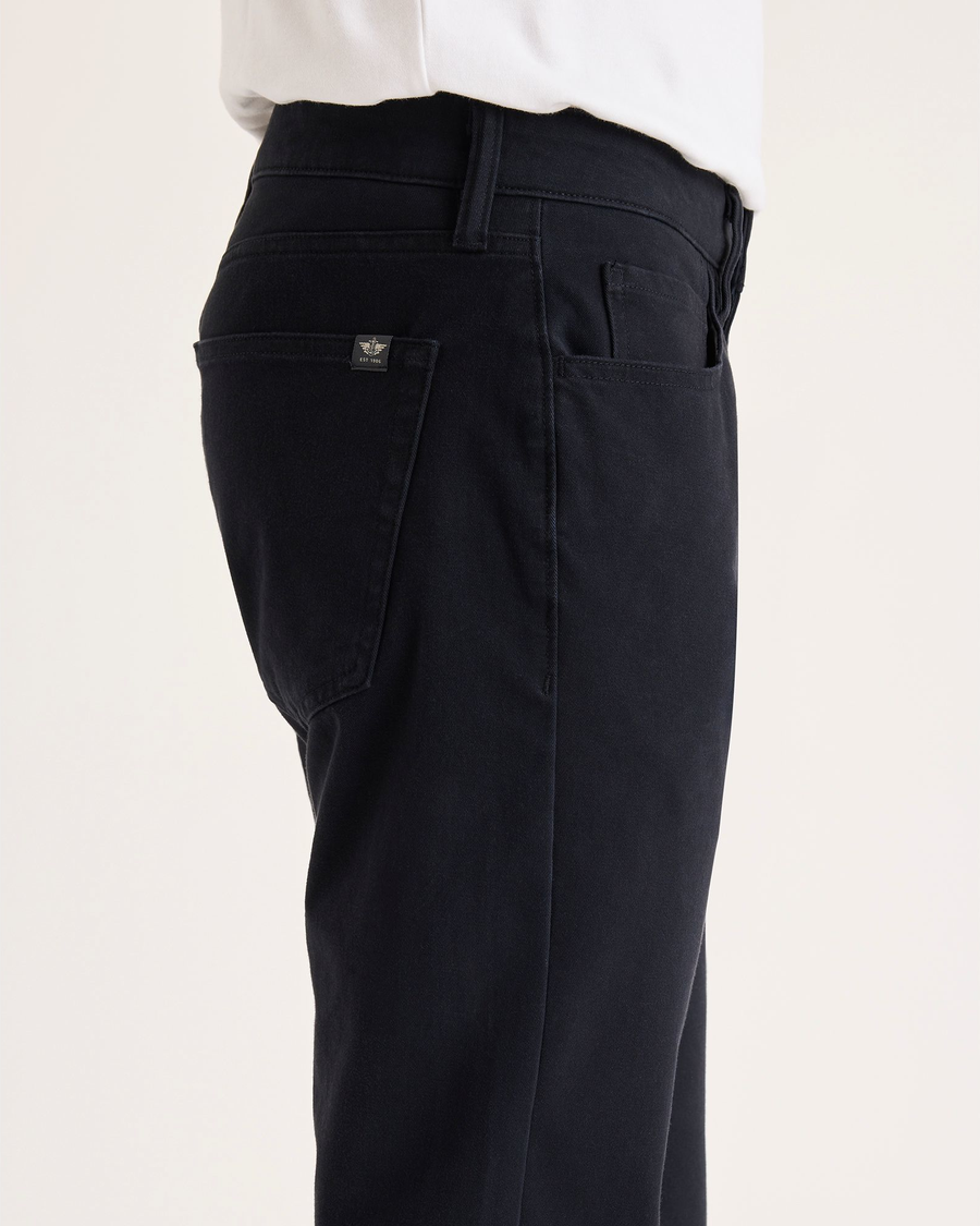 Side view of model wearing Beautiful Black All-Day 5-Pocket, Slim Fit.