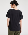 Back view of model wearing Beautiful Black Deep V-Neck Tee, Relaxed Fit.