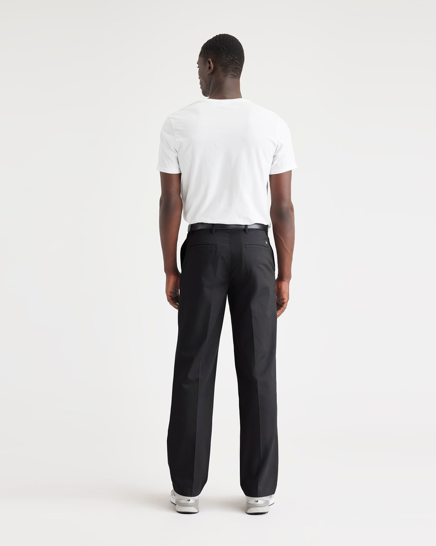 Back view of model wearing Beautiful Black Essential Chinos, Classic Fit.