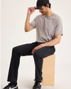 View of model wearing Beautiful Black Go Activeflex Chino, Slim Fit.