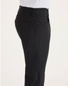 Side view of model wearing Beautiful Black Go Airweave 5-Pocket, Slim Tapered Fit.