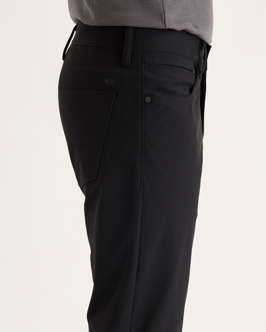 Side view of model wearing Beautiful Black Go Airweave 5-Pocket, Straight Fit.
