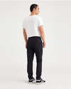 Back view of model wearing Beautiful Black Go Chino, Slim Tapered Fit with Airweave.