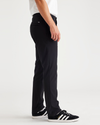 Side view of model wearing Beautiful Black Go Chino, Slim Tapered Fit with Airweave.