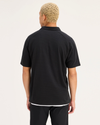 Back view of model wearing Beautiful Black Go Raglan Polo, Regular Fit.