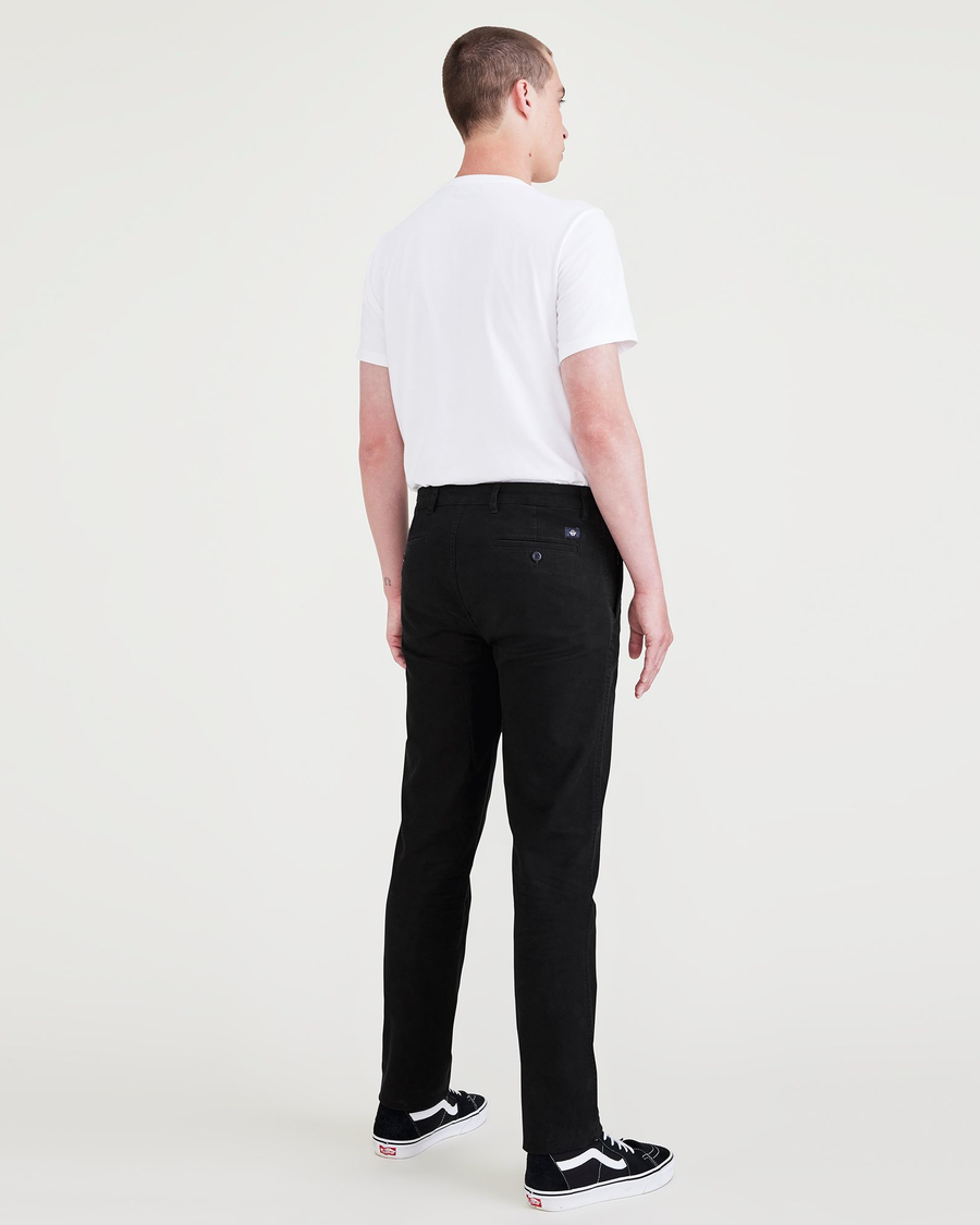 Back view of model wearing Beautiful Black Original Chinos, Slim Fit.