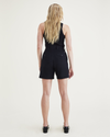 Back view of model wearing Beautiful Black Original Shorts, Pleated.