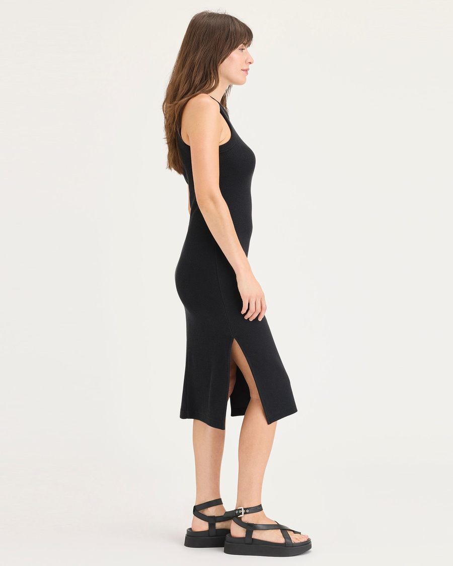 Side view of model wearing Beautiful Black Rib Knit Tank Dress with Lofi Knit, Slim Fit.