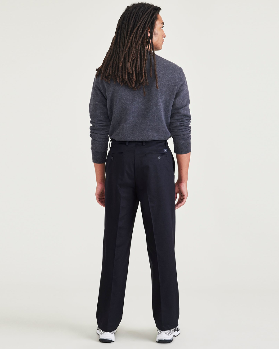 Back view of model wearing Beautiful Black Signature Iron Free Khakis, Relaxed Fit with Stain Defender®.