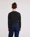 Back view of model wearing Beautiful Black Wrap Sweater, Slim Fit.