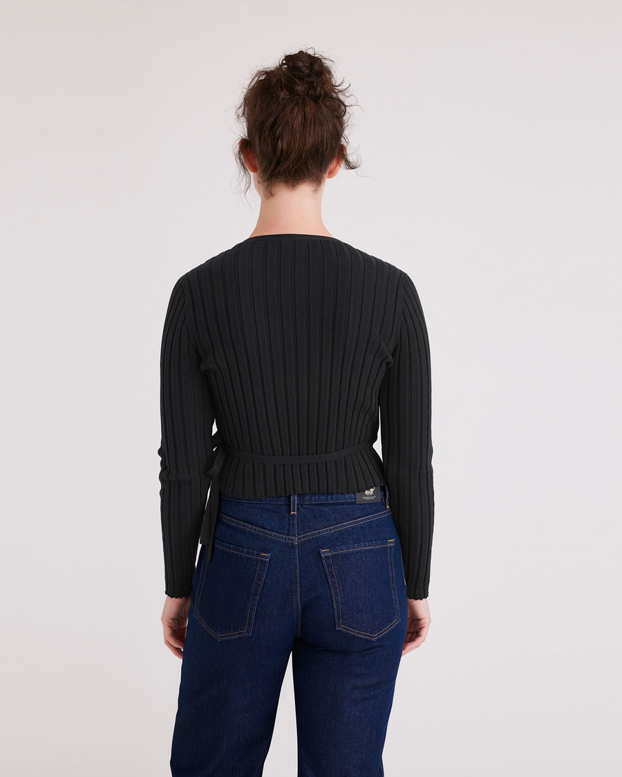 Back view of model wearing Beautiful Black Wrap Sweater, Slim Fit.