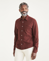 Front view of model wearing Bitter Chocolate Knit Button-Up Shirt, Regular Fit.