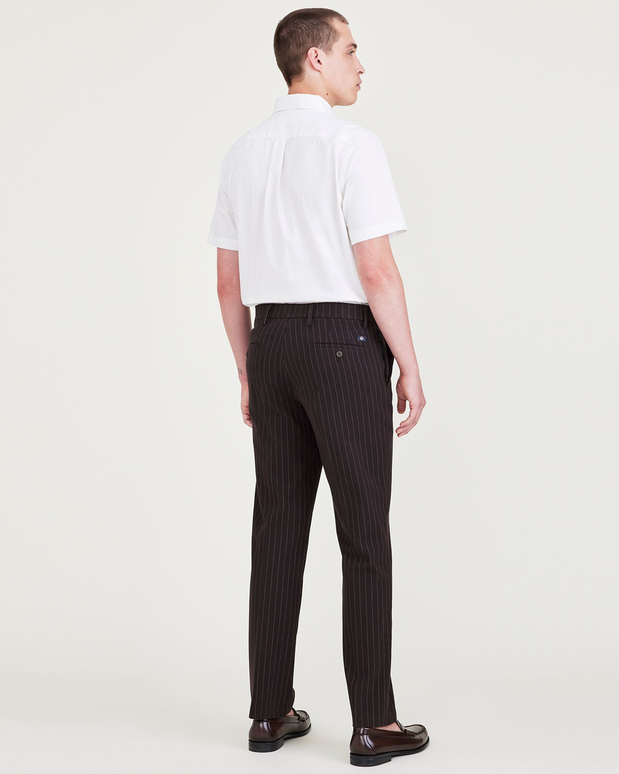 Back view of model wearing Black Bean City Tech Trousers, Straight Fit.