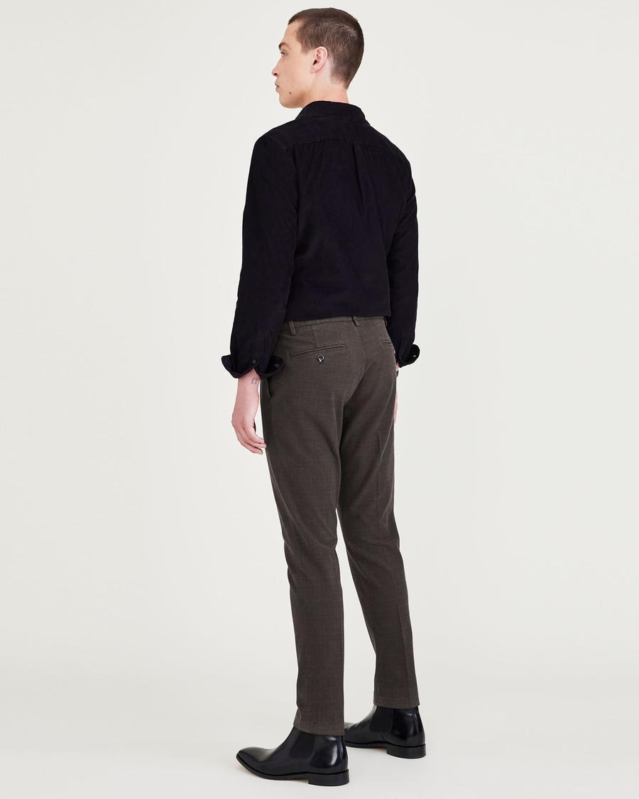 Back view of model wearing Black Bean Crafted Trousers, Slim Tapered Fit.