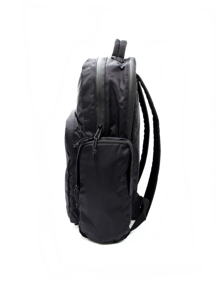 View of model wearing Black Classic Backpack.