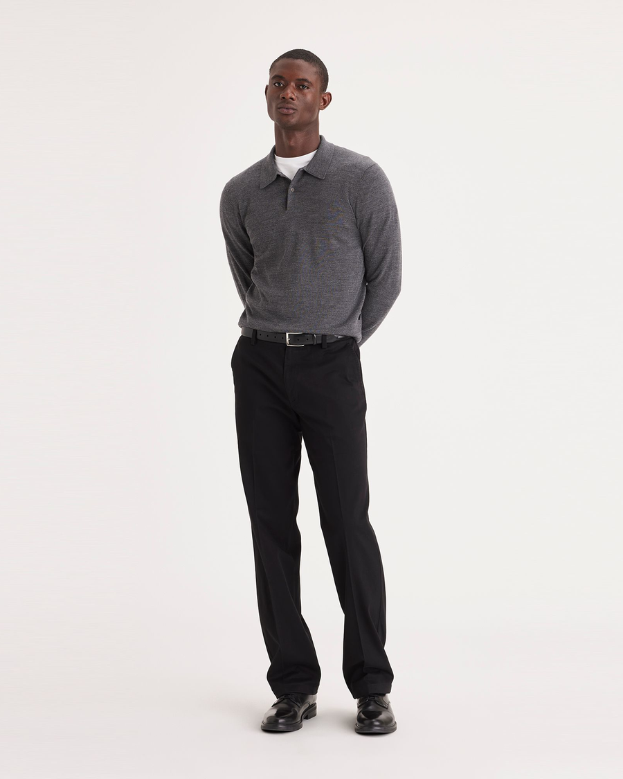 Front view of model wearing Black Easy Khakis, Classic Fit.