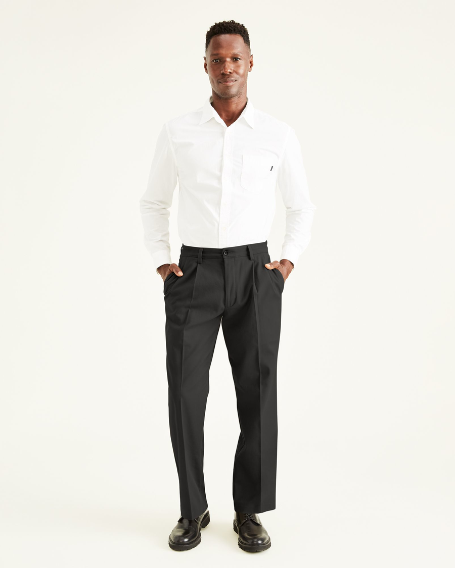 Front view of model wearing Black Easy Khakis, Pleated, Classic Fit.