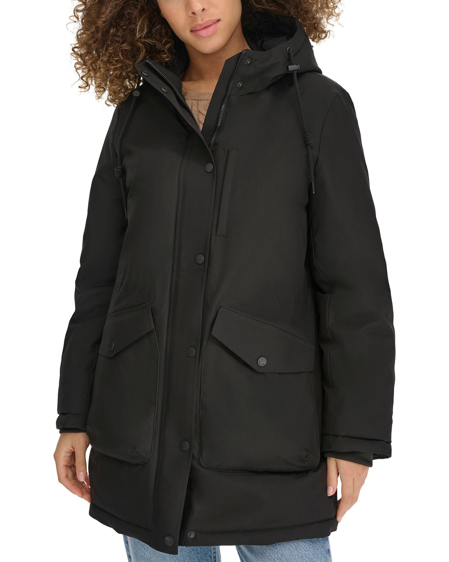 View of model wearing Black Hooded Parka.