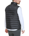 View of model wearing Black Lightweight Nylon Packable Vest.