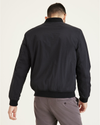Back view of model wearing Black Recycled Dry Touch Nylon Bomber.