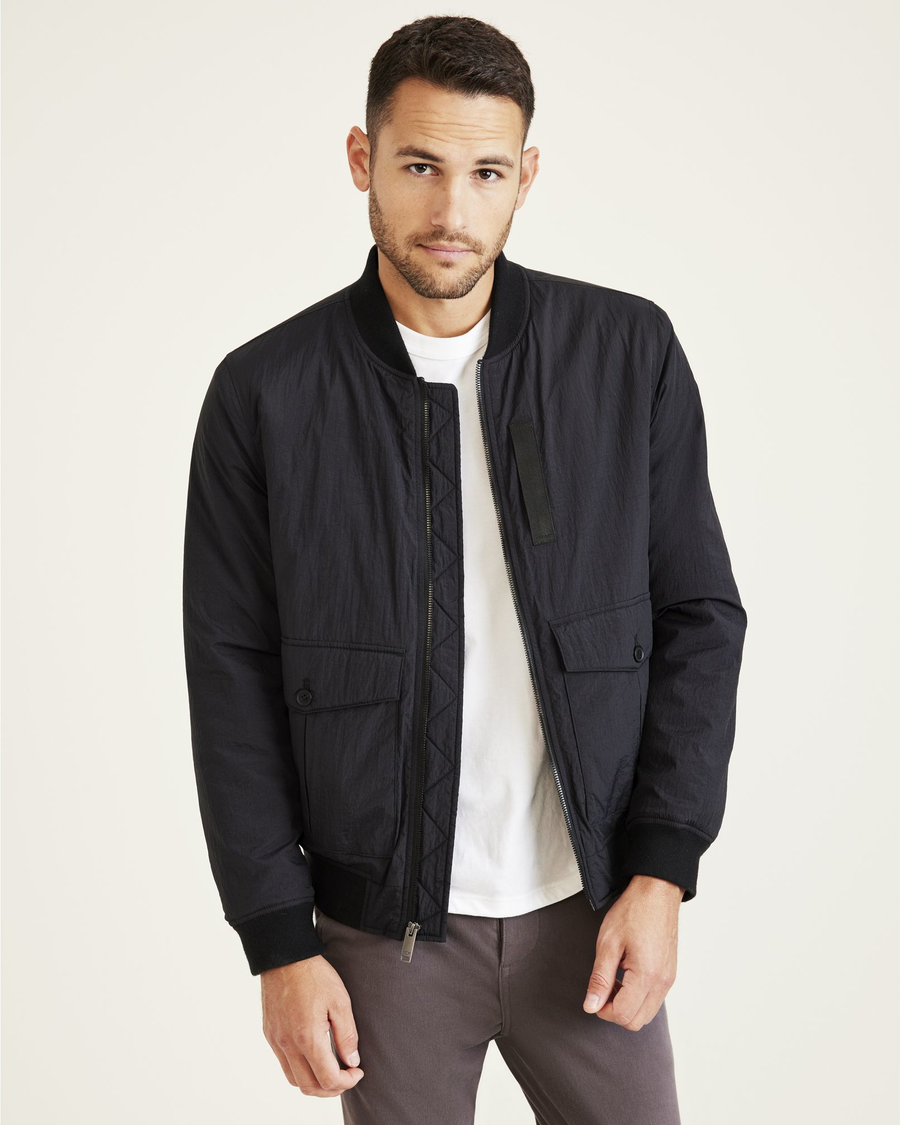Front view of model wearing Black Recycled Dry Touch Nylon Bomber.