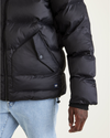 View of model wearing Black Recycled Nylon Puffer Parka.