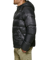 Side view of model wearing Black Recycled Nylon Puffer Parka.