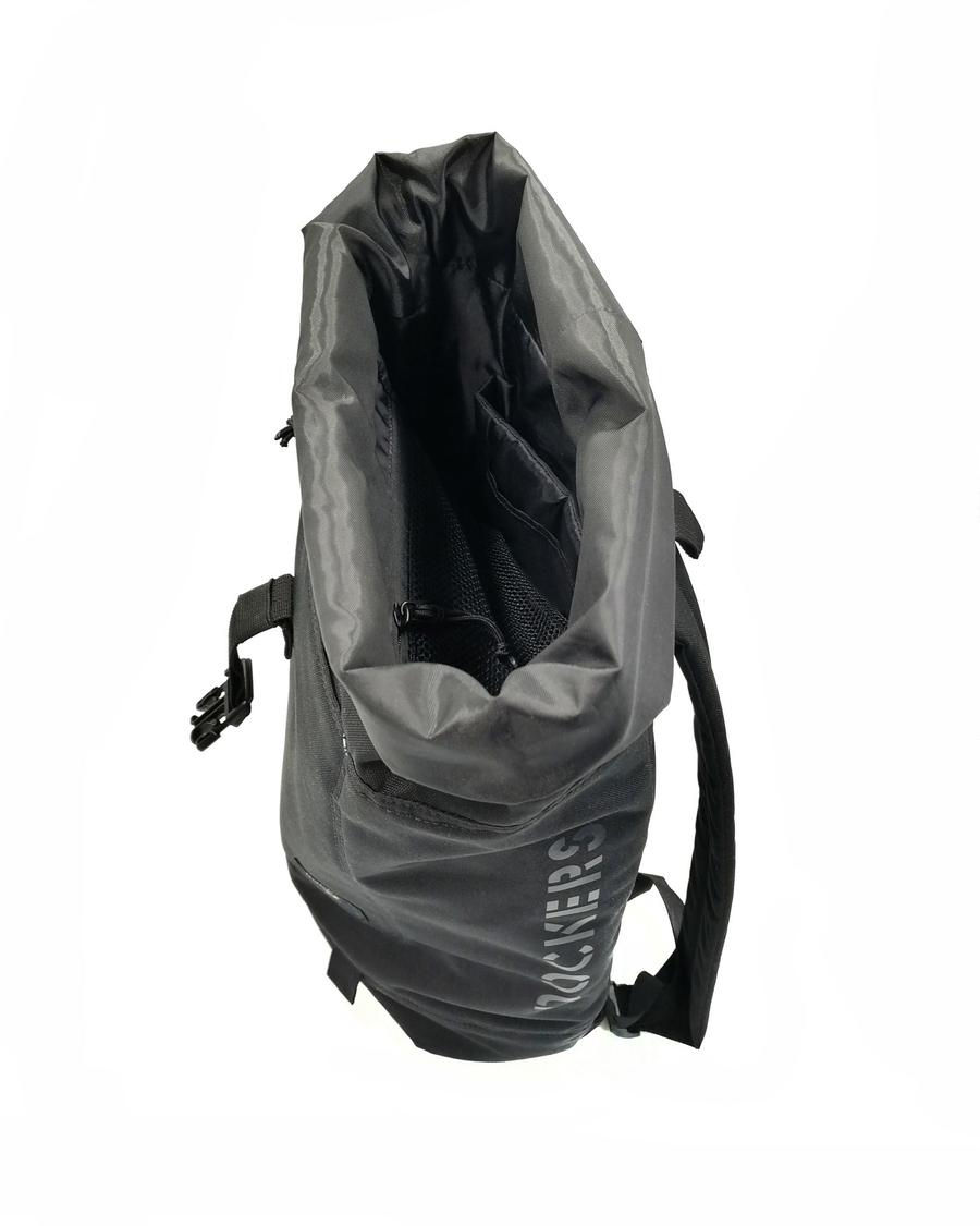 View of model wearing Black Roll Up Backpack, 23 L.