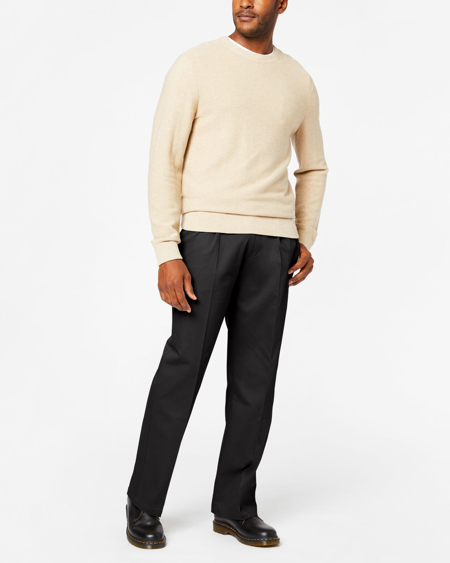 Front view of model wearing Black Signature Khakis, Pleated, Relaxed Fit.