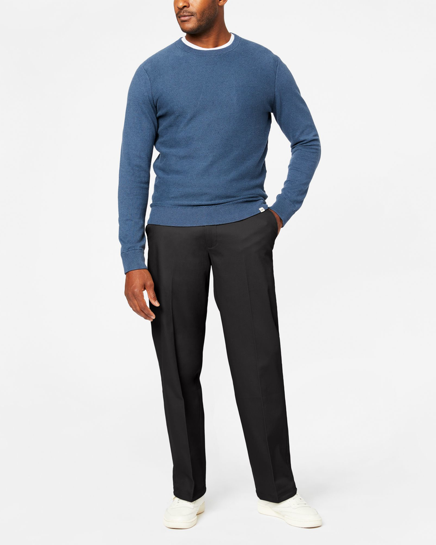 Front view of model wearing Black Signature Khakis, Relaxed Fit.