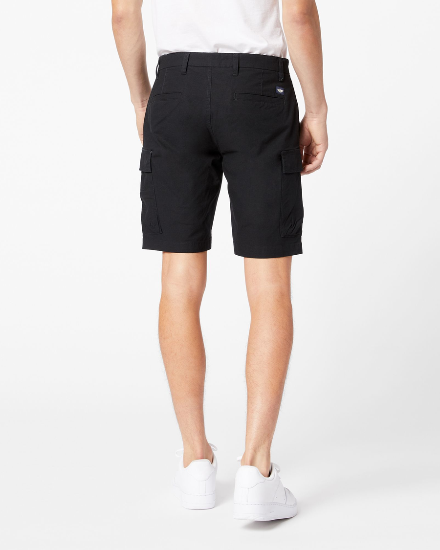 Back view of model wearing Black Tech Cargo 9" Shorts.