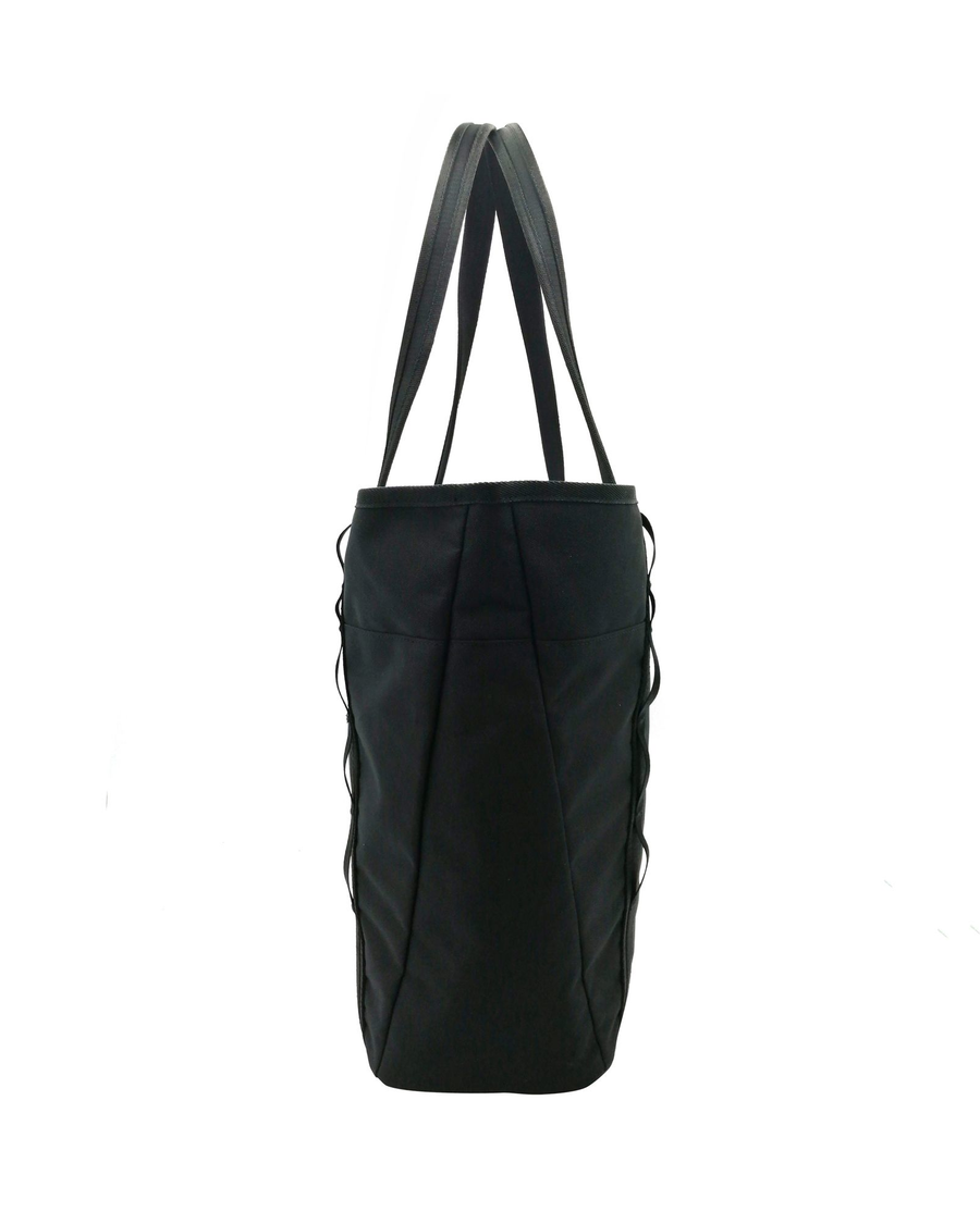View of model wearing Black Tote Bag, 25 L.