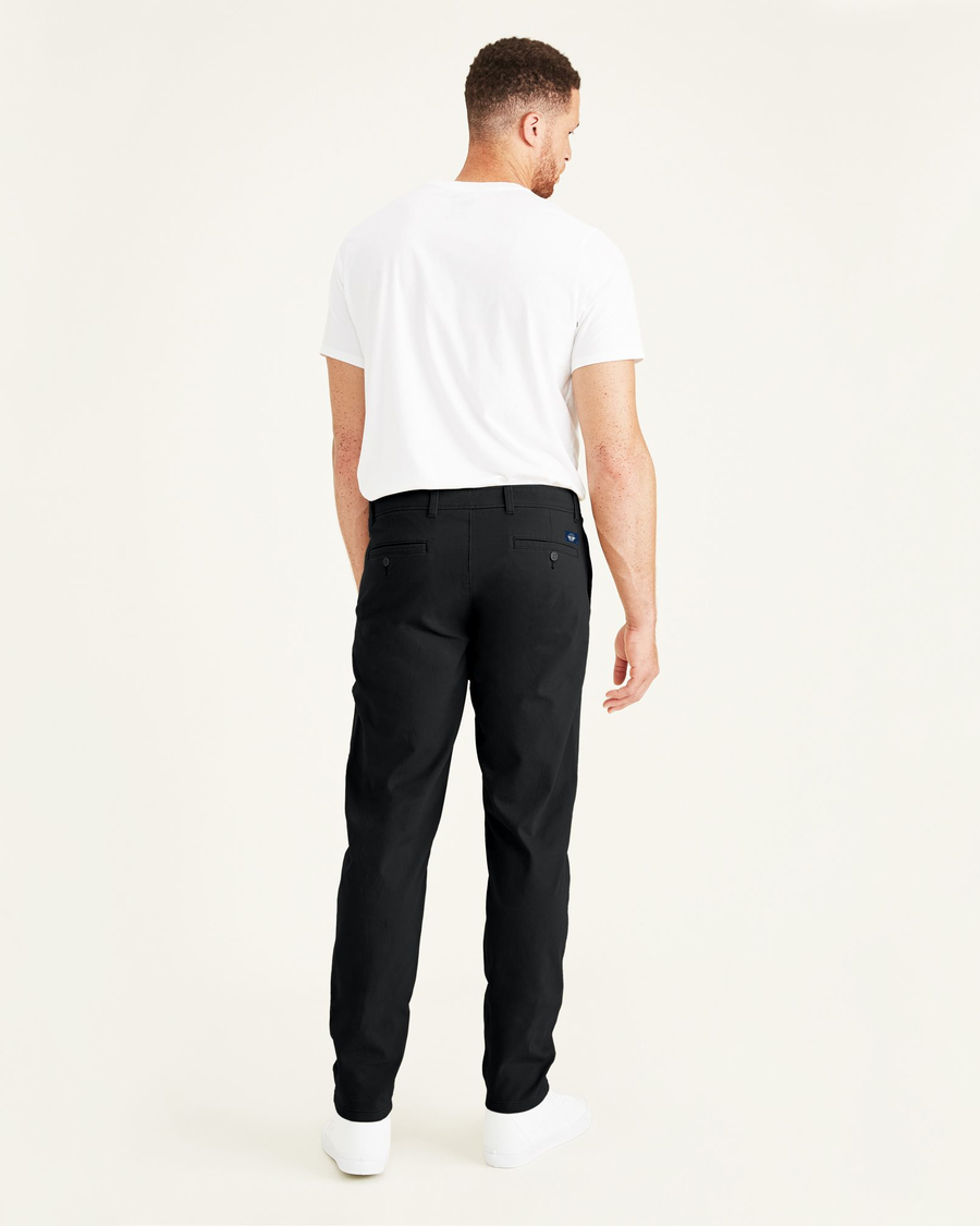 Back view of model wearing Black Ultimate Chinos, Athletic Fit (Big and Tall).