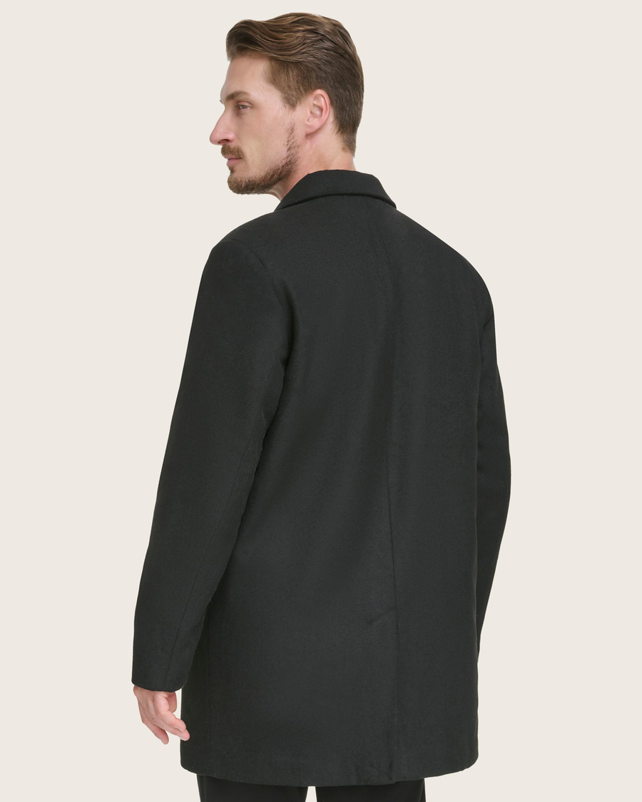 Back view of model wearing Black Wool Blend Top Coat.