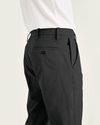 View of model wearing Black Workday Khakis, Slim Fit.