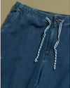 View of model wearing Blue Denim Cargo Pants with Draw String Waist - 28 x 22.