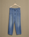Front view of model wearing Blue Denim Double Pleated Pants - 32 x 29.
