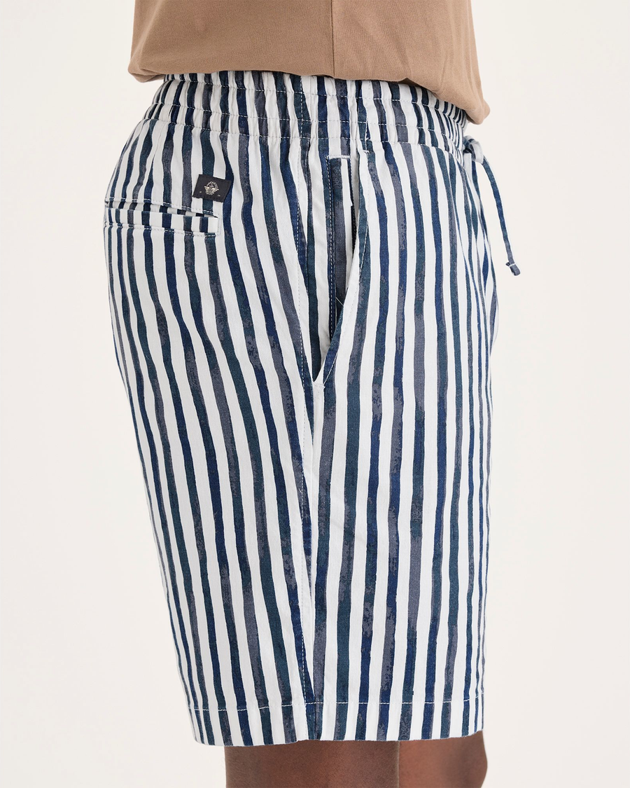 Side view of model wearing Blue Depths Ultimate Pull On 8.5" Short.