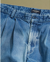 View of model wearing Blue Double Pleated Denim Pants - 32 x 31.