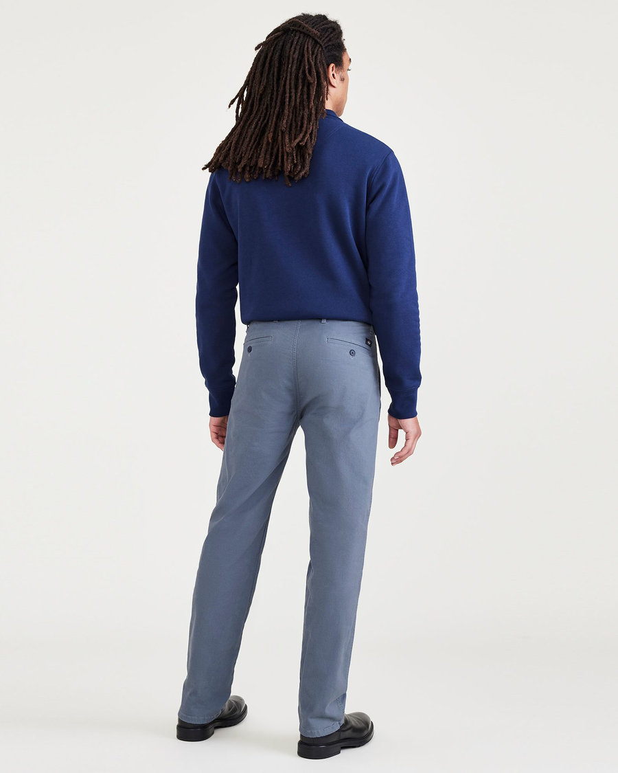 Back view of model wearing Blue Fusion Original Chinos, Slim Fit.