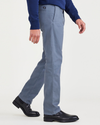 Side view of model wearing Blue Fusion Original Chinos, Slim Fit.