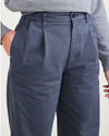 View of model wearing Blue Fusion Original Khakis, Pleated, High Waisted Tapered Fit.