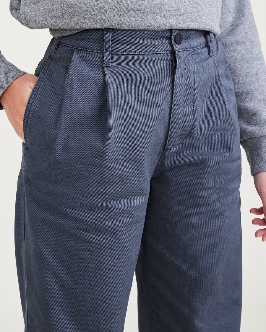 View of model wearing Blue Fusion Original Khakis, Pleated, High Waisted Tapered Fit.